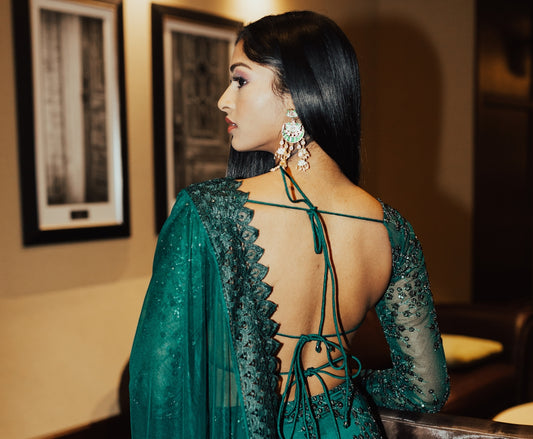 woman in green and white floral dress