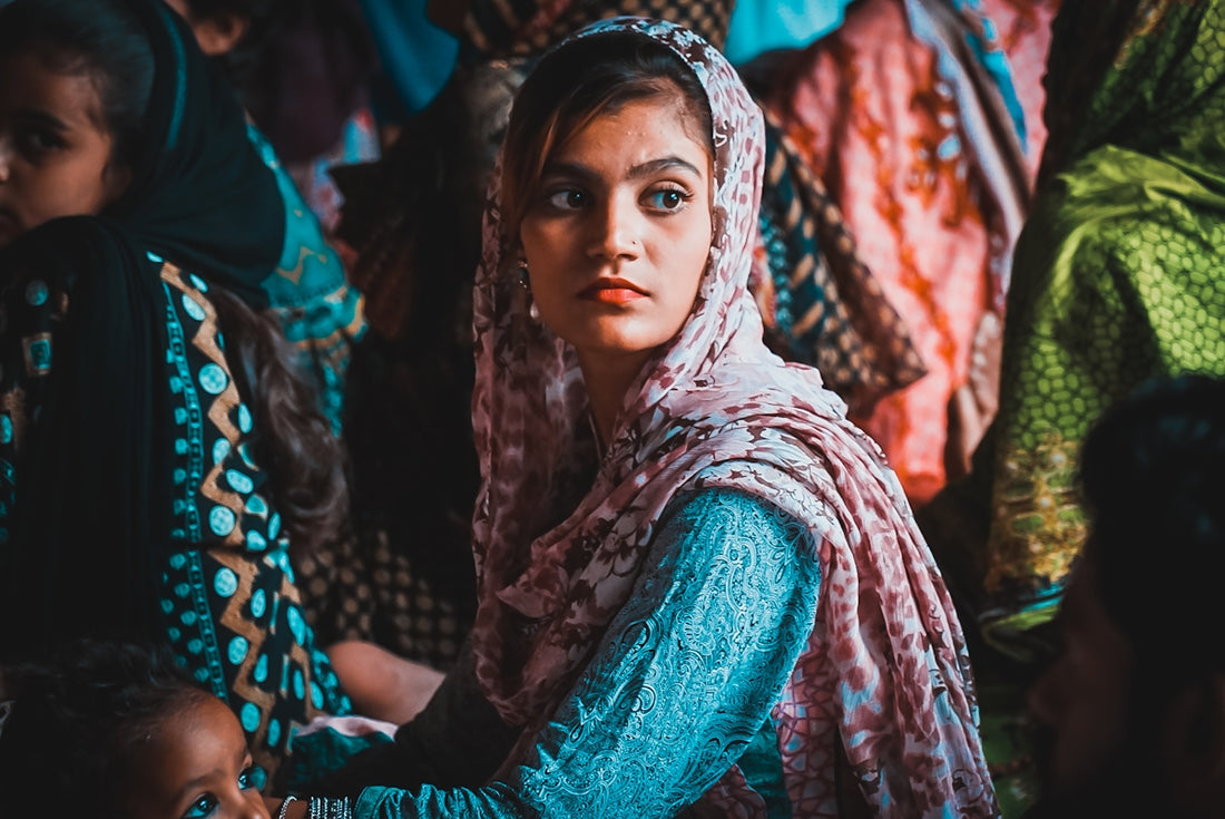 woman in green and brown hijab