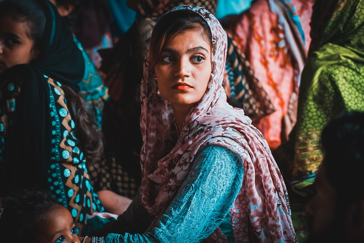 woman in green and brown hijab