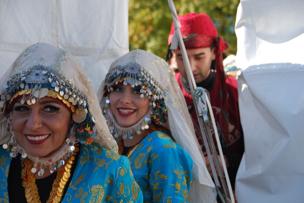 a group of people wearing traditional clothing