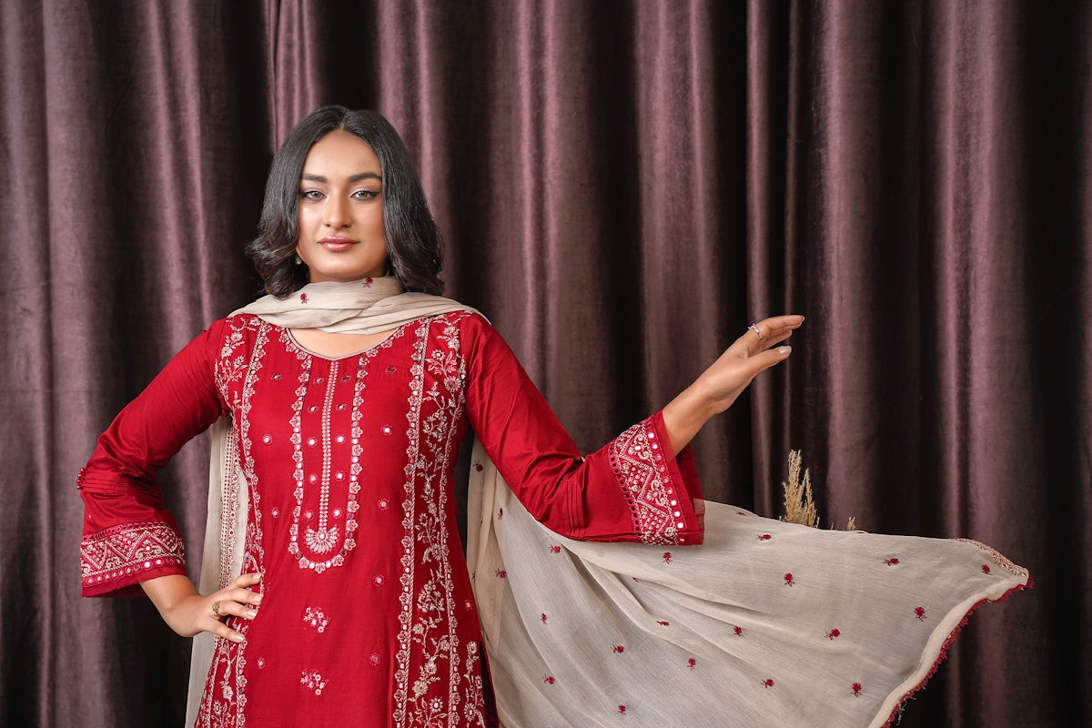 a woman in a red and white outfit